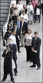 In this Sept. 10, 2009 photo, job hunters wait in line for a resume critique at a job fair in Philadelphia. (AP Photo/Matt Slocum)